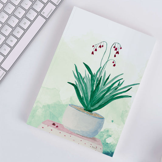 Softback Notebook A5 Plain Paper - Delicate watercolour painting of flowering plant in grey pot with deep burgundy blooms and green leaves on cream background