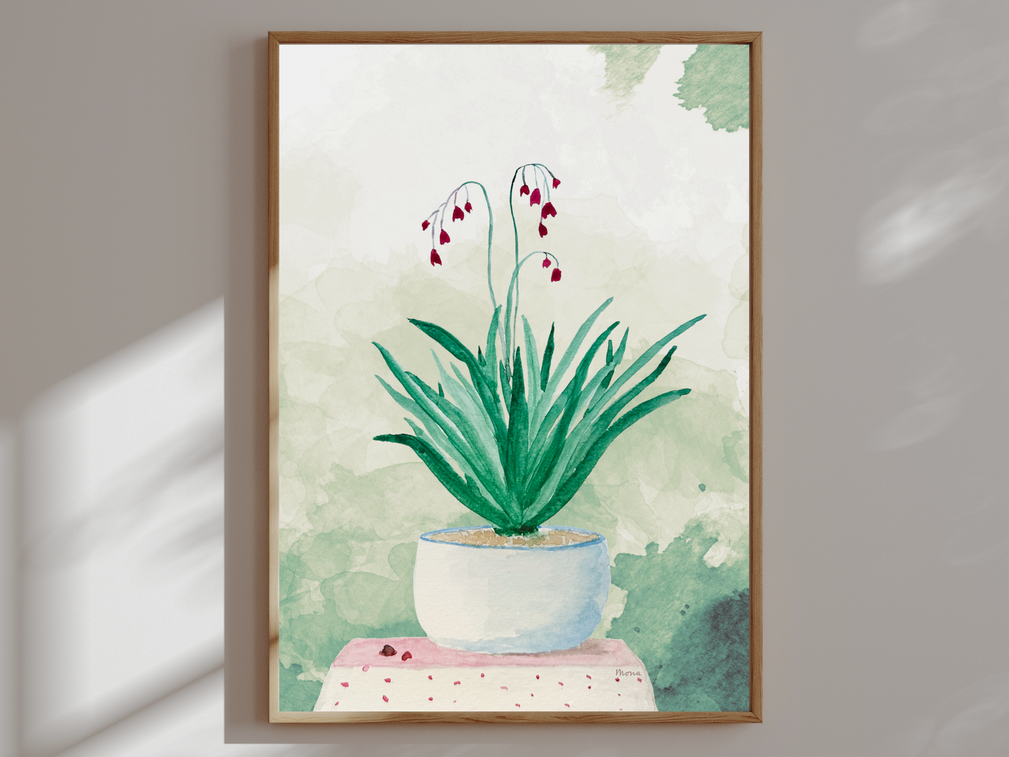 Framed artwork of a potted plant with a minimal background
