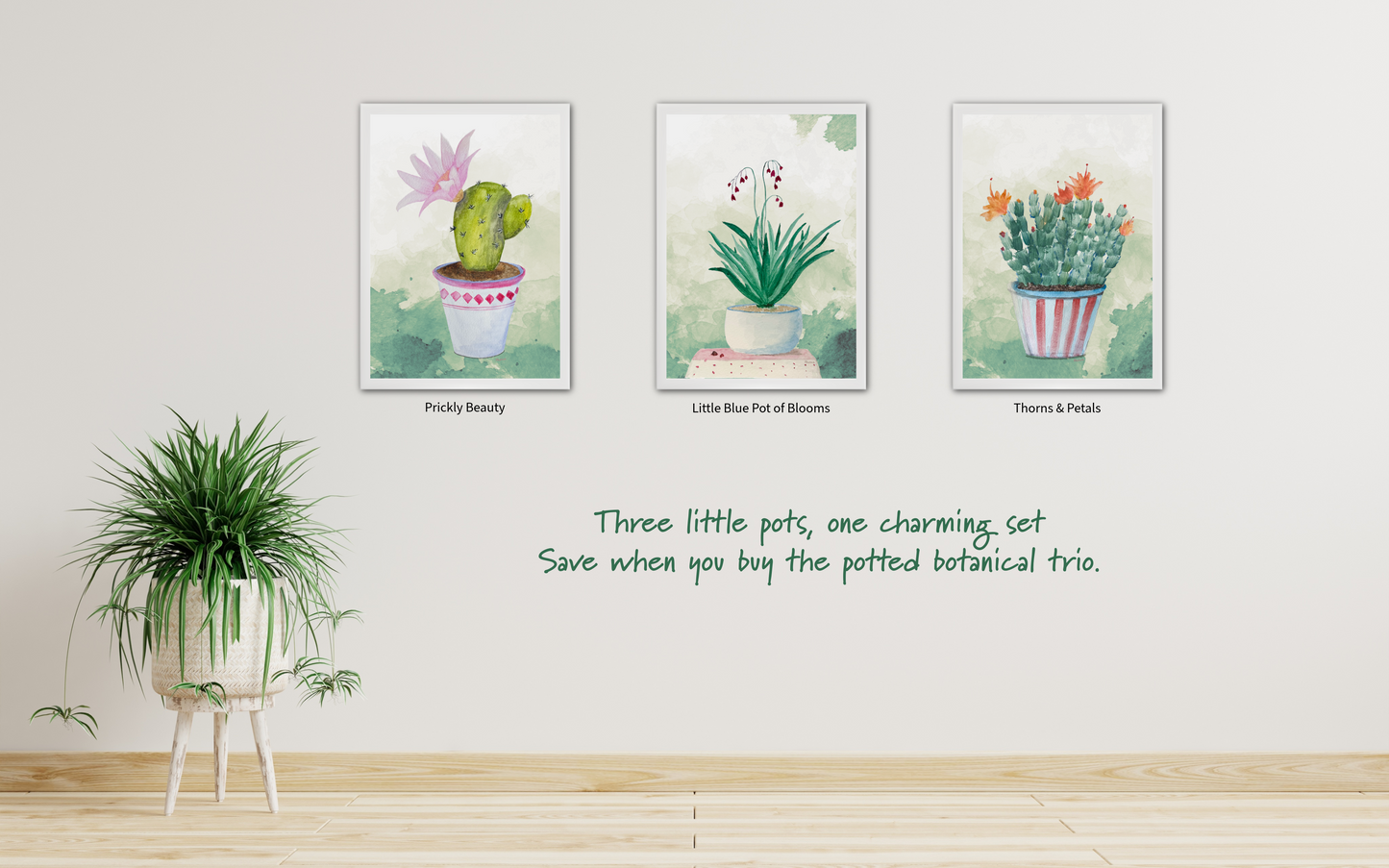 Three framed illustrations of potted plants on a wall with a plant in a pot on the floor. Captioned - Three little pots, one charming set. Save when you buy the potted botanical trio. 