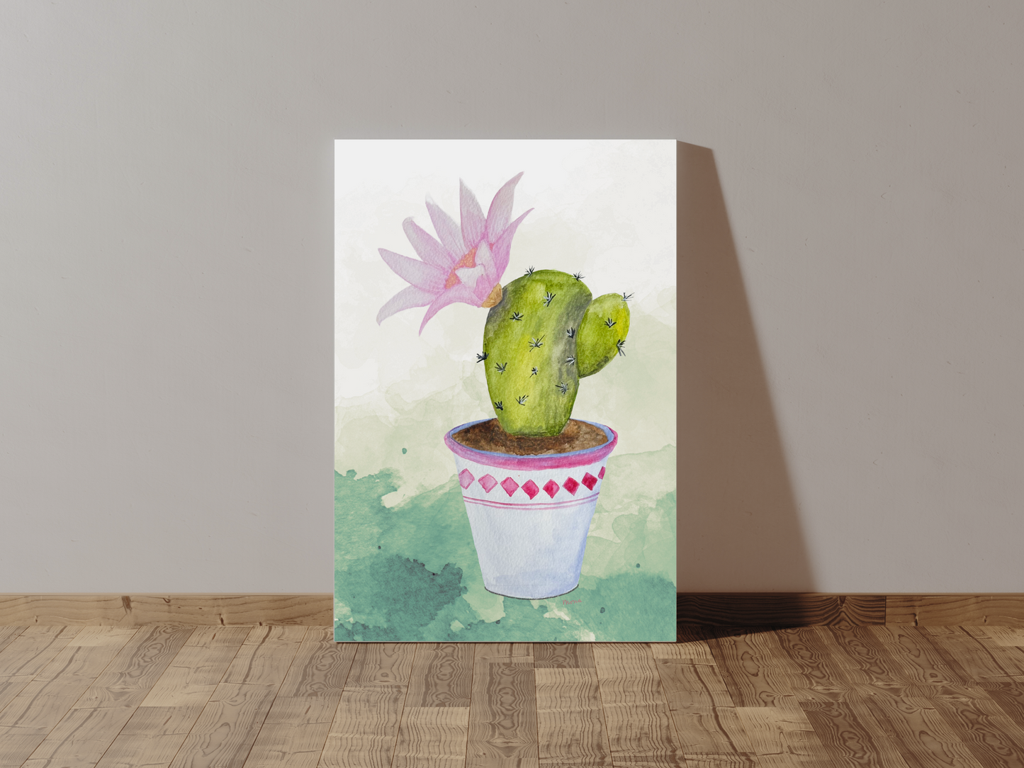 Canvas print of a potted cactus with a pink flower on a wooden floor.