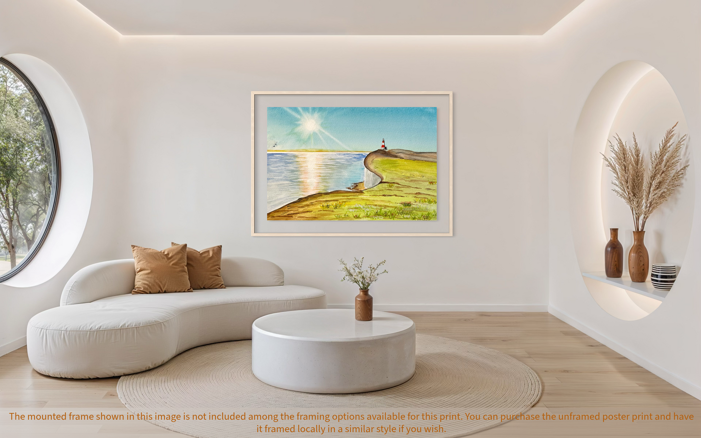 Modern living room with a framed artwork of a beach scene on the wall.