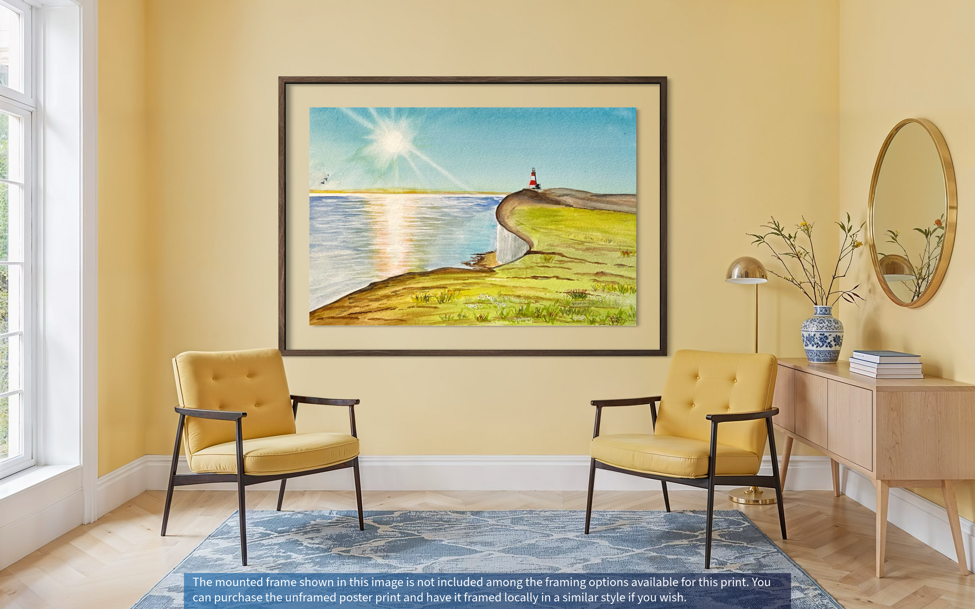 Living room with yellow armchairs, a framed artwork, and a side table.
