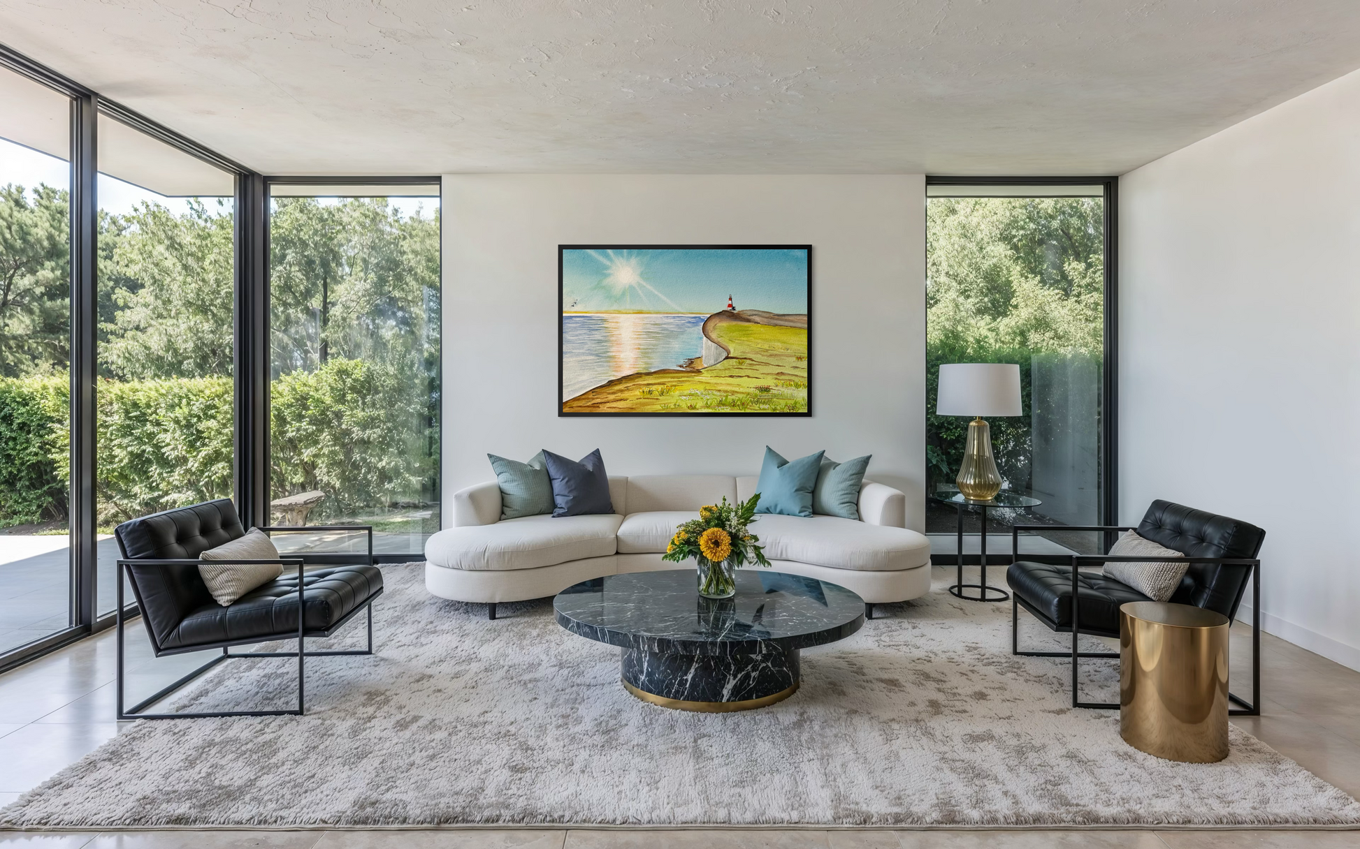 Modern living room with a white sofa, black chairs, and a marble coffee table.