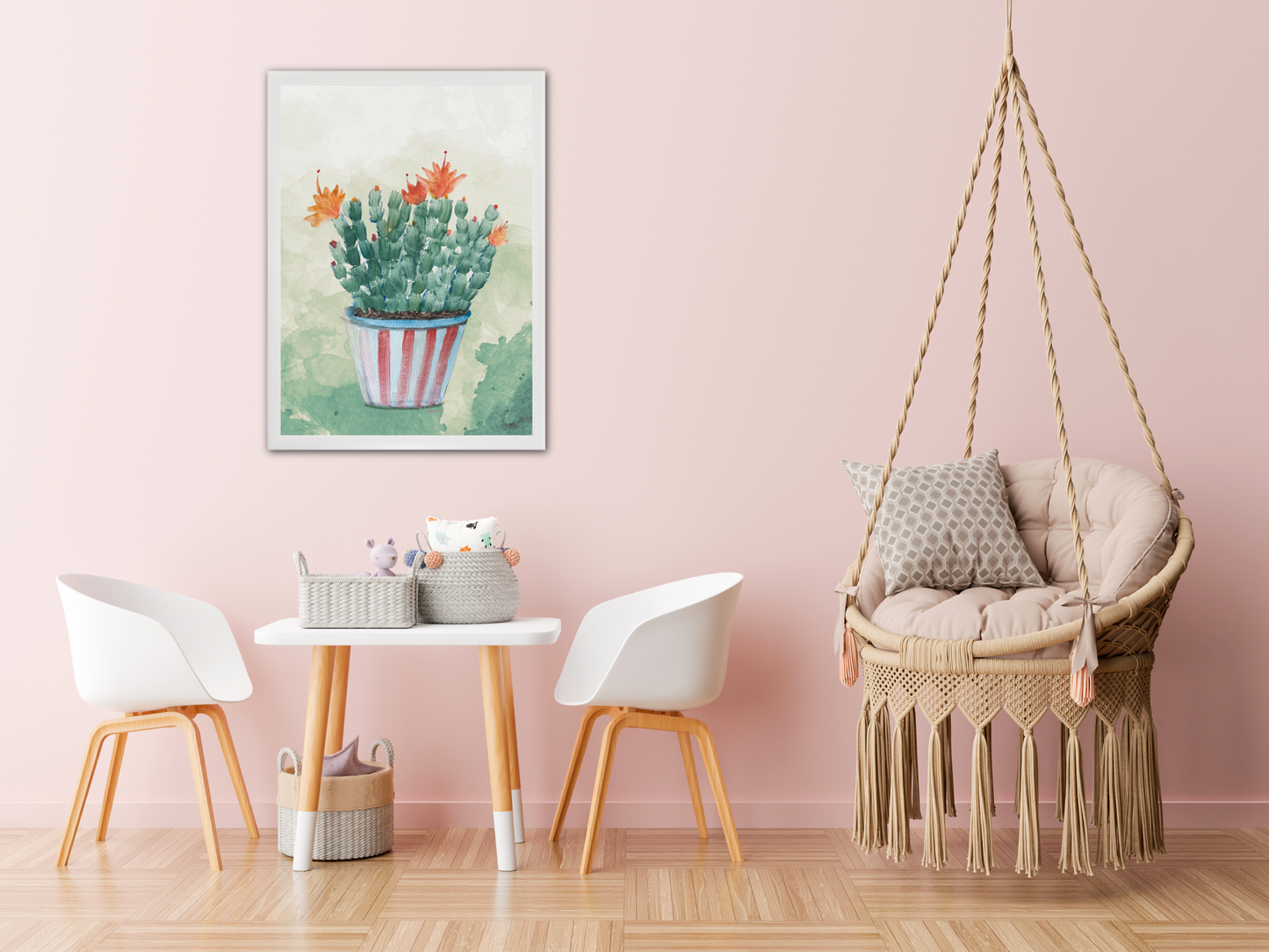 Children's room with a cactus painting, chairs, table, and hanging chair.