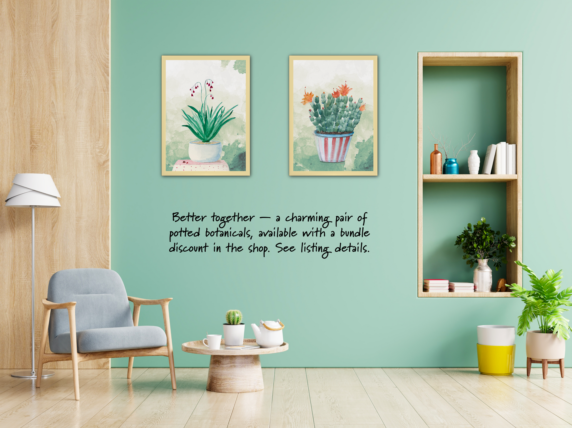 Modern living room with green walls, a gray armchair, and decorative plants. On the wall are two framed botanical artworks of potted plants against a textured background. 