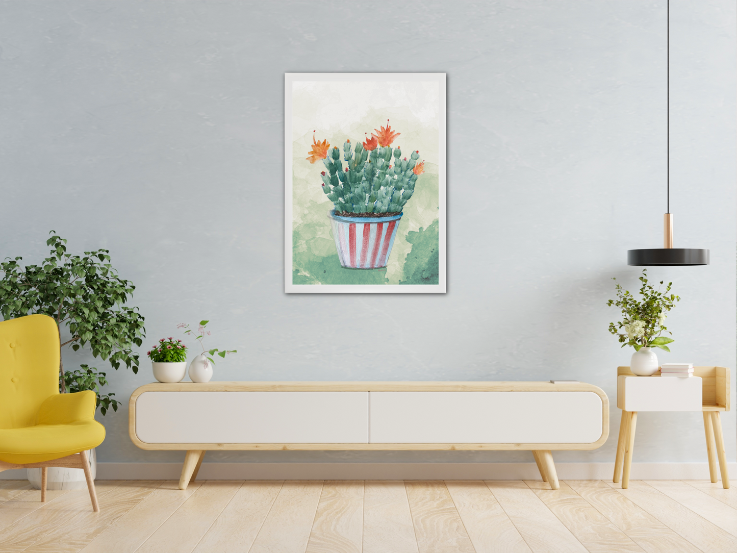Modern living room with a yellow armchair, white console table, and framed artwork of a blooming Christmas cactus on the wall.