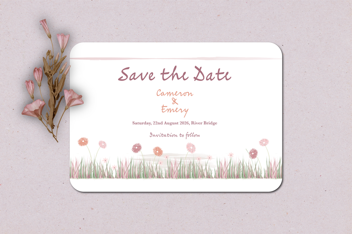 Save the Date card with floral design on a light background