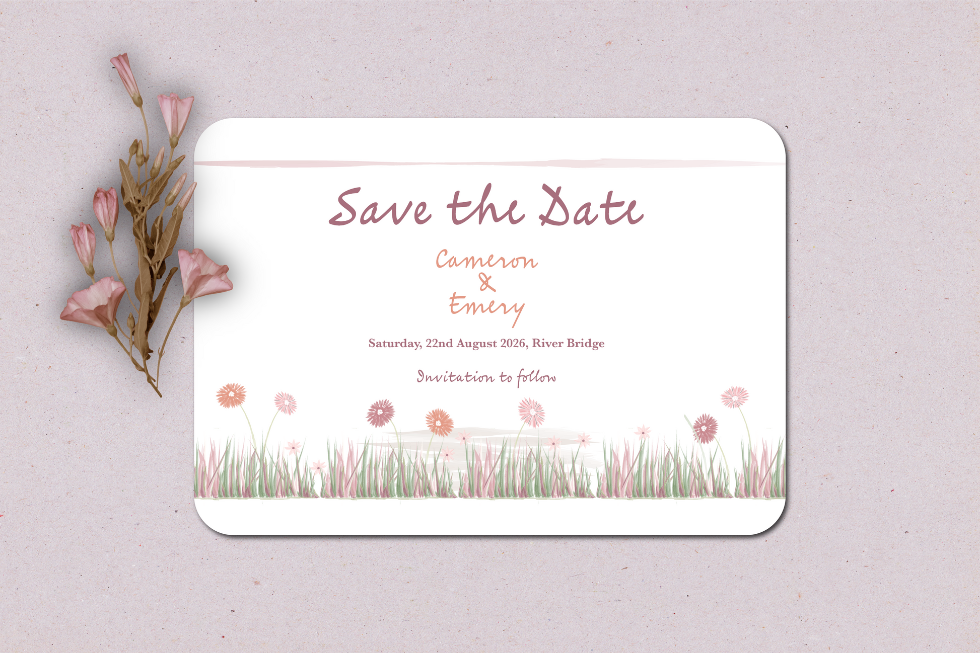 Save the Date card with floral design on a light background
